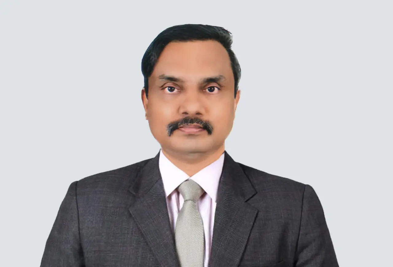 Balu, a cybersecurity expert with 25 years of experience, leads security audits and assessments at ValueMentor, enhancing frameworks and ensuring compliance.