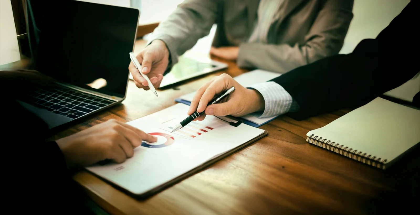 Team engaged in group discussion in office room, representing collaborative approach to GDPR compliance checklist for organizations in 2025